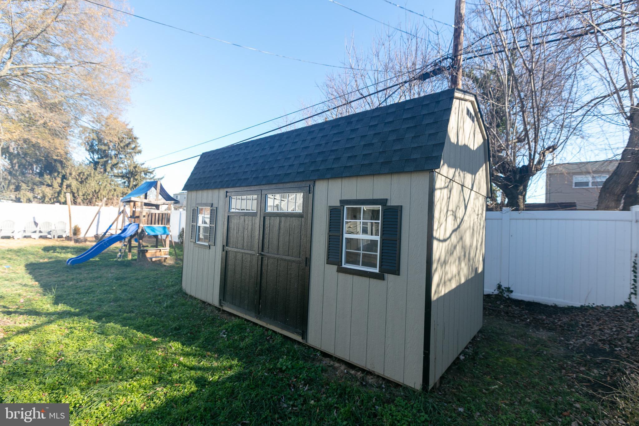 750 Miller Drive Dover, DE 19901 - Photo 19 of 49 a backyard of a house with lots of green space