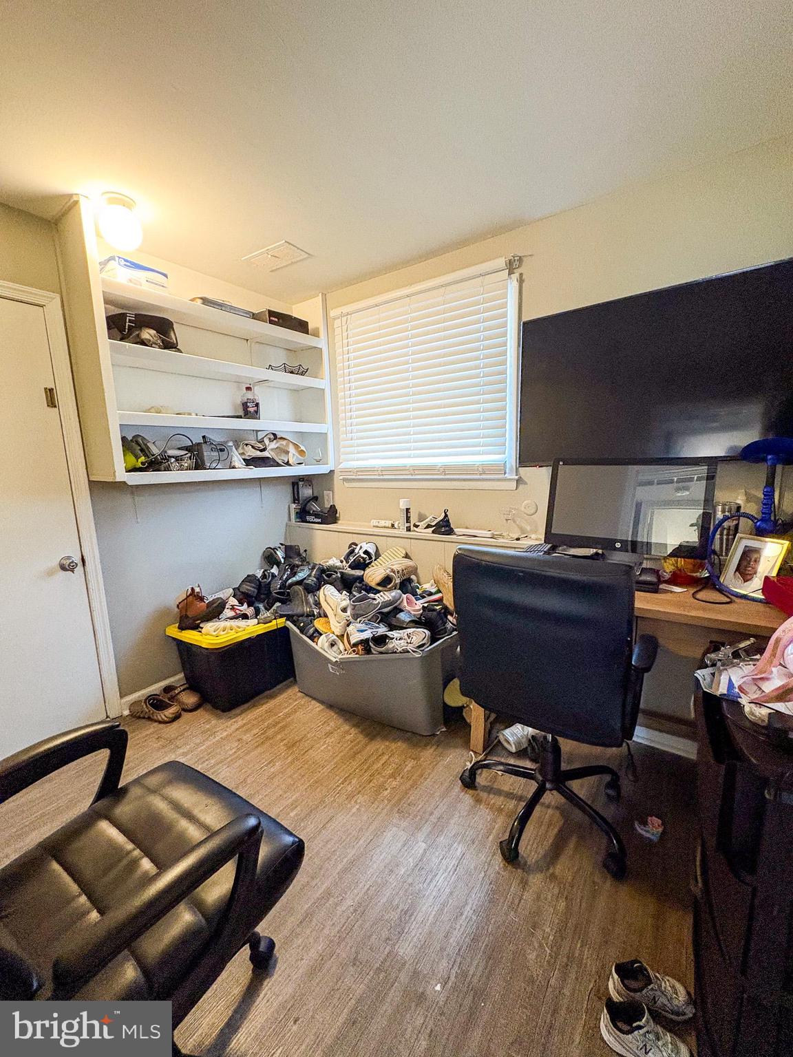 750 Miller Drive Dover, DE 19901 - Photo 22 of 49 a living room with lots of furniture and a wooden floor