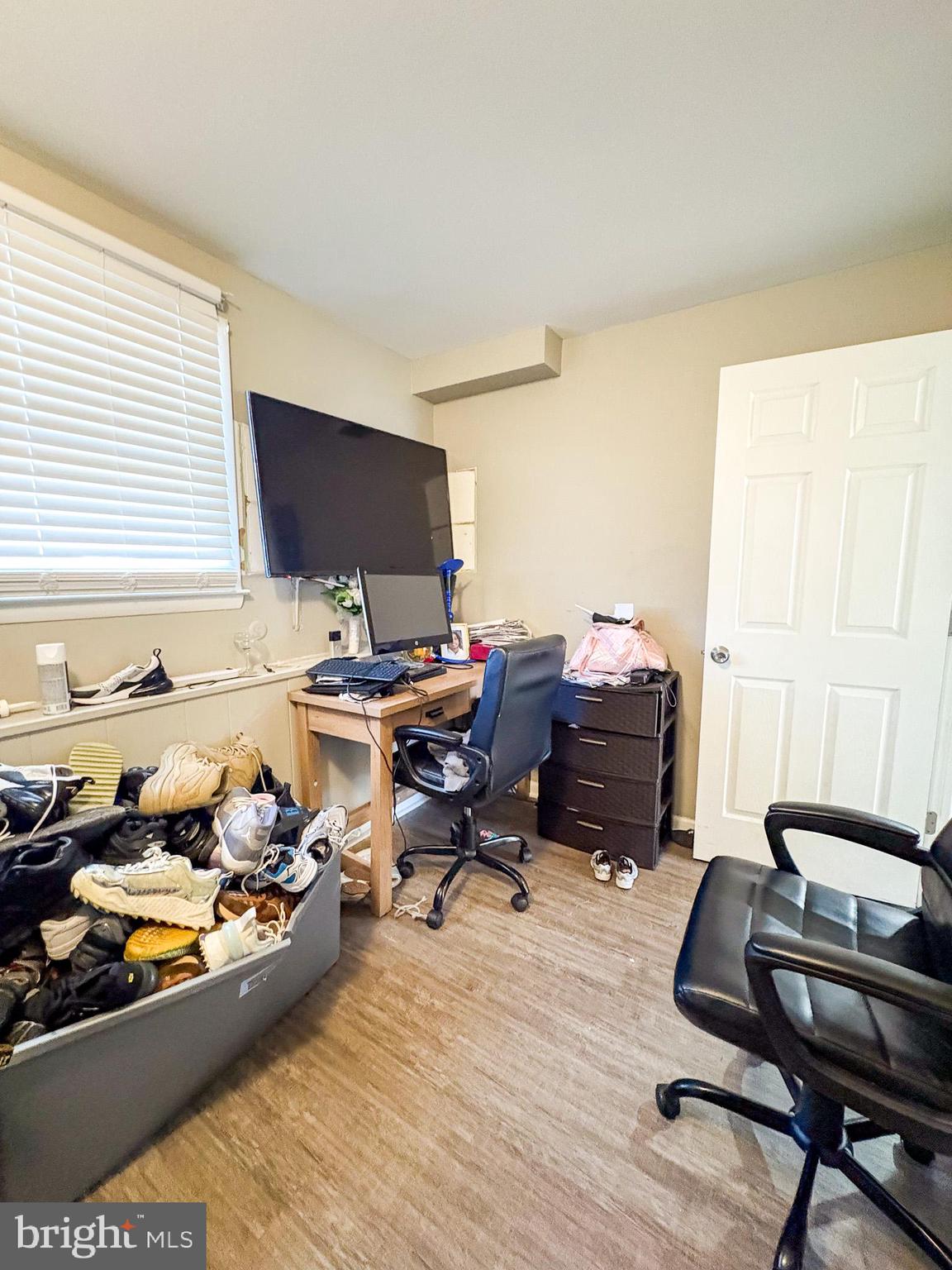 750 Miller Drive Dover, DE 19901 - Photo 23 of 49 a room with wooden floor and a window