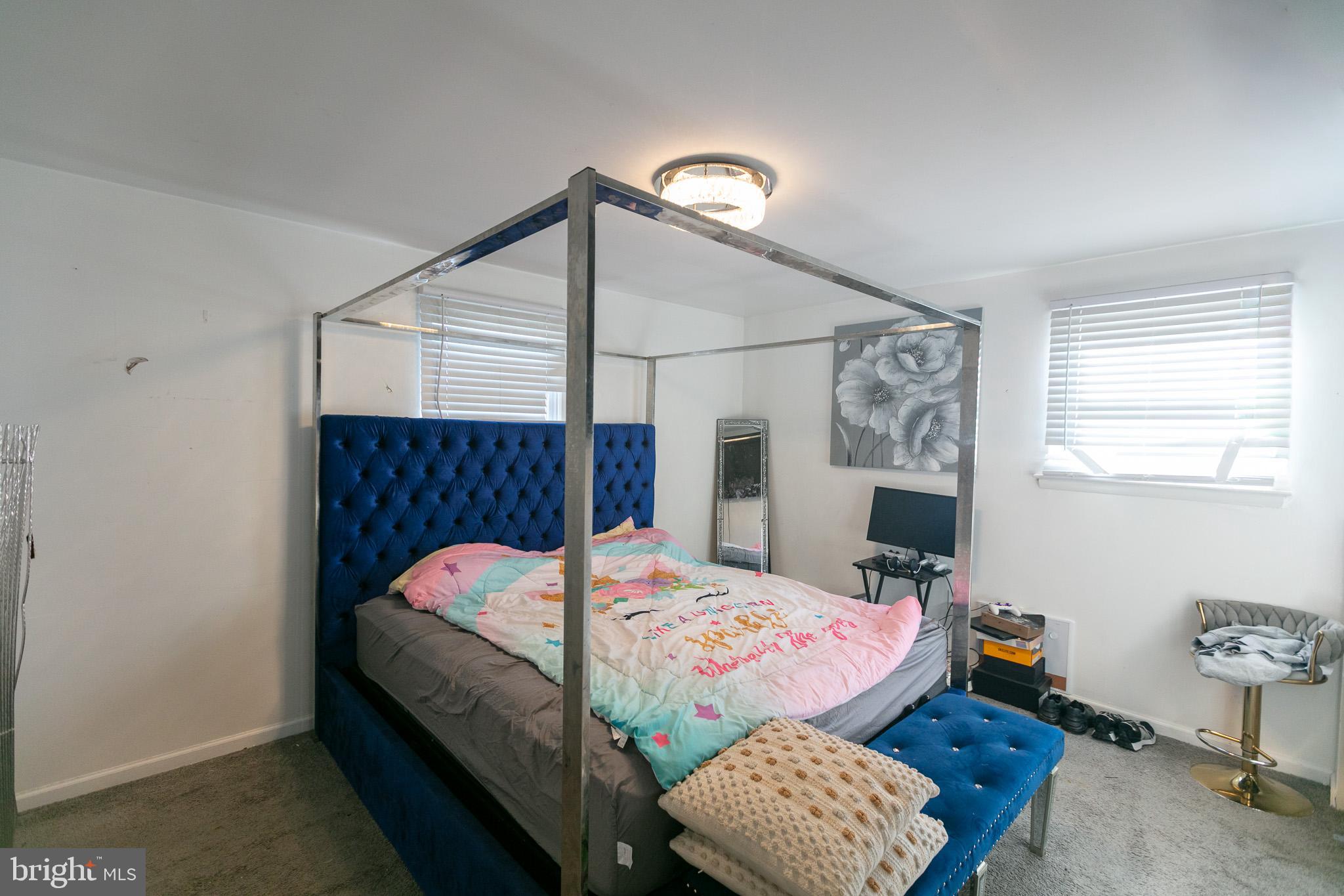 750 Miller Drive Dover, DE 19901 - Photo 25 of 49 a bed room with a bed and a chair