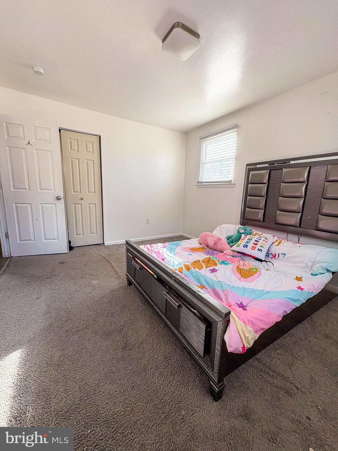 750 Miller Drive Dover, DE 19901 - Photo 29 of 49 a bedroom with a bed and window