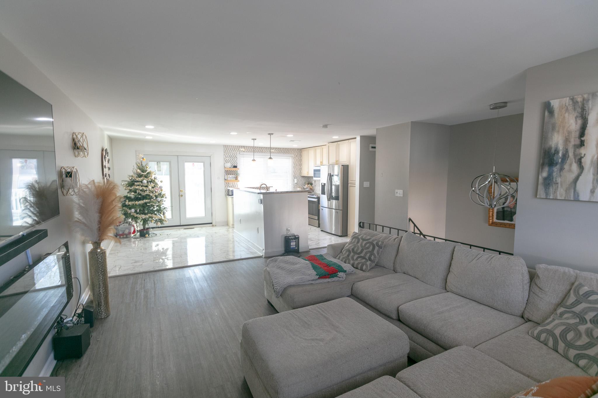 750 Miller Drive Dover, DE 19901 - Photo 7 of 49 a living room with furniture and a wooden floor