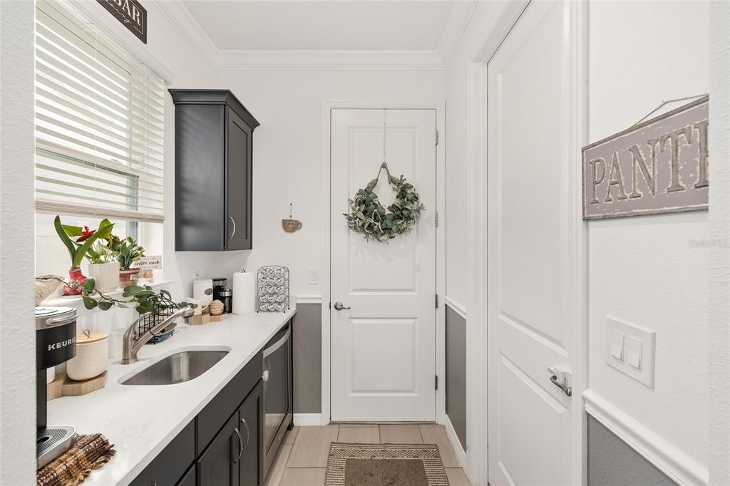 7208 Southwest 65th Place Road Ocala, FL 34474 - Photo 27 of 76 a bathroom with a sink and a mirror