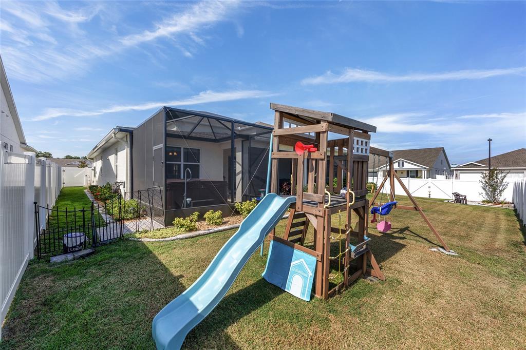 7208 Southwest 65th Place Road Ocala, FL 34474 - Photo 60 of 76 a view of a room with gym equipment