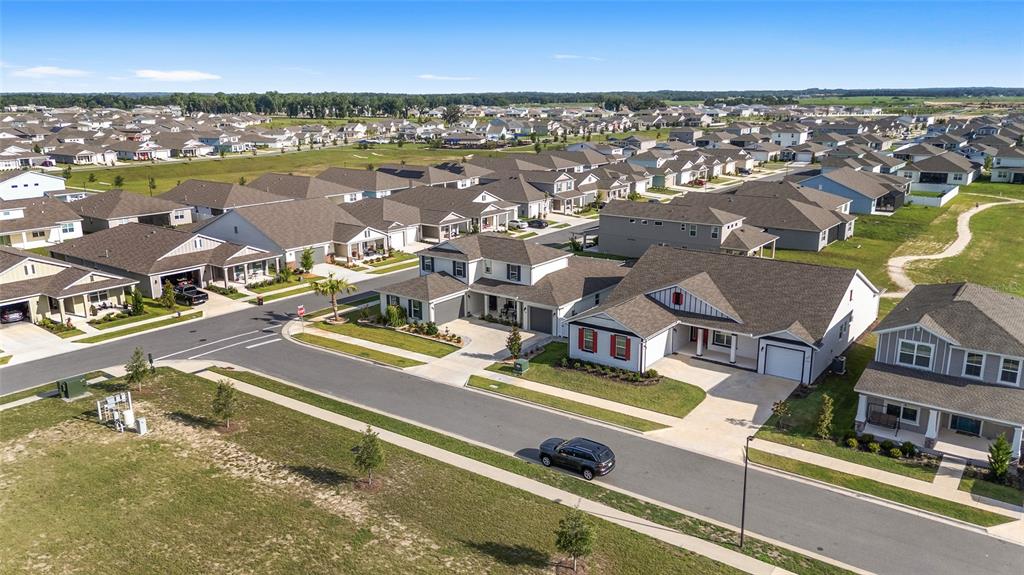7208 Southwest 65th Place Road Ocala, FL 34474 - Photo 63 of 76 an aerial view of residential houses with city view