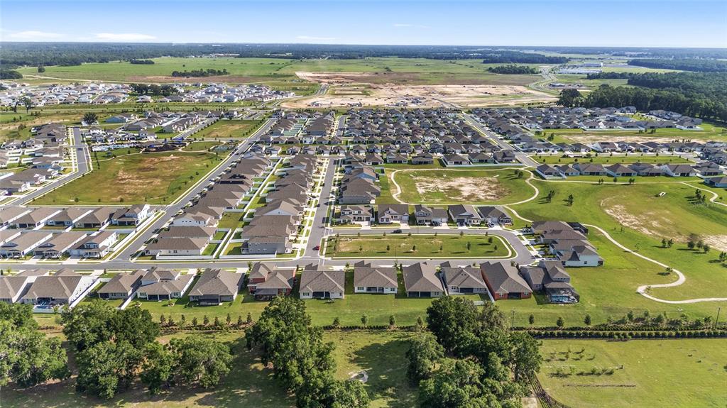 7208 Southwest 65th Place Road Ocala, FL 34474 - Photo 68 of 76 a view of a city with an ocean view