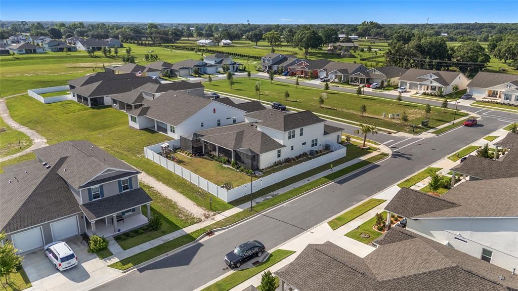 7208 Southwest 65th Place Road Ocala, FL 34474 - Photo 72 of 76 an aerial view of a house with a ocean view