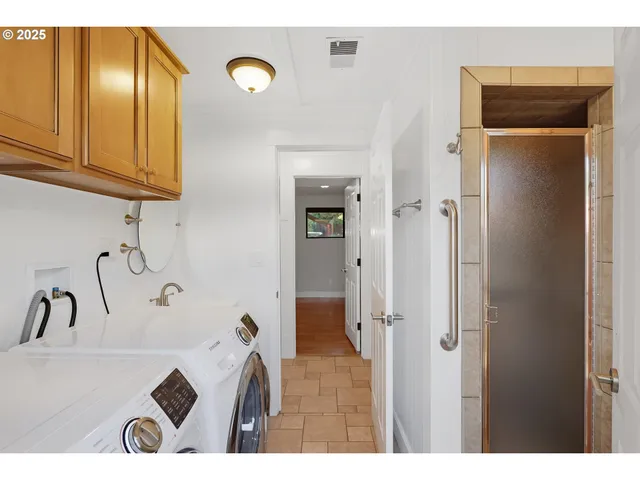 a view of a kitchen from the dinning room