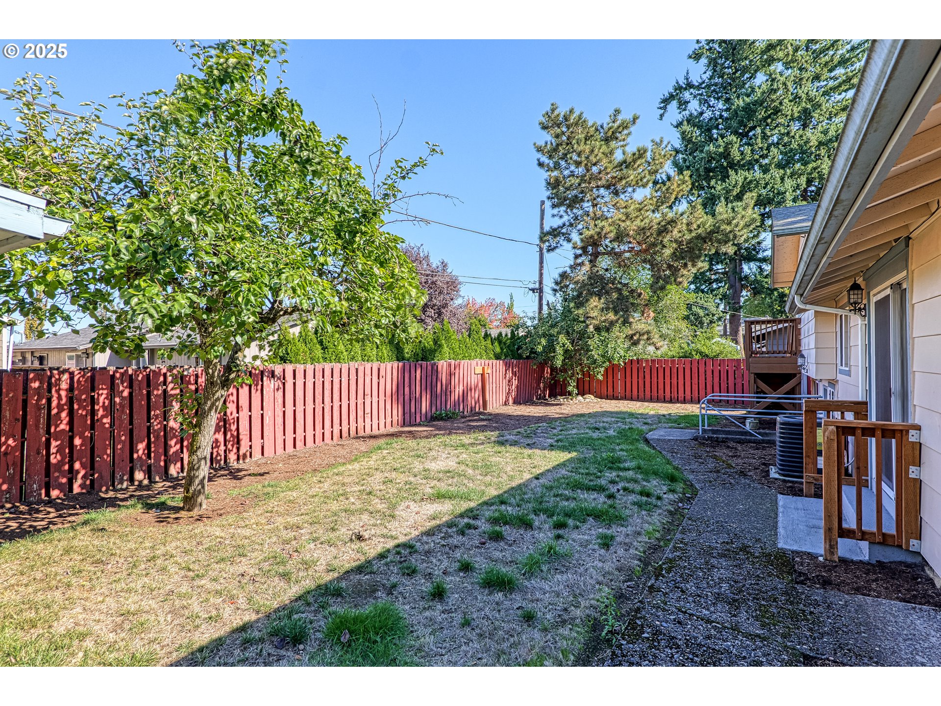 17909 Northeast Everett Court Portland, OR 97230 - Photo 21 of 25 a view of a backyard with a tree