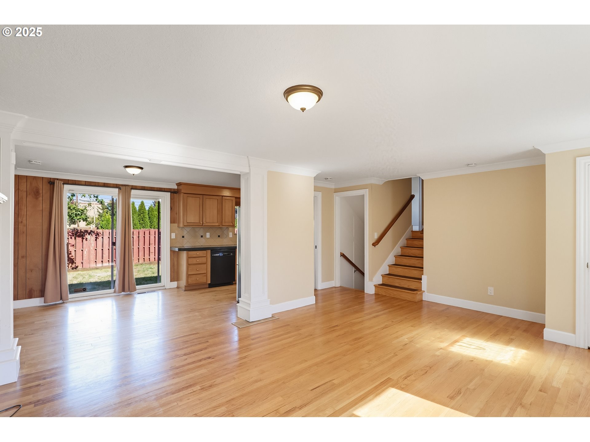 17909 Northeast Everett Court Portland, OR 97230 - Photo 5 of 25 a view of an empty room with wooden floor and a window