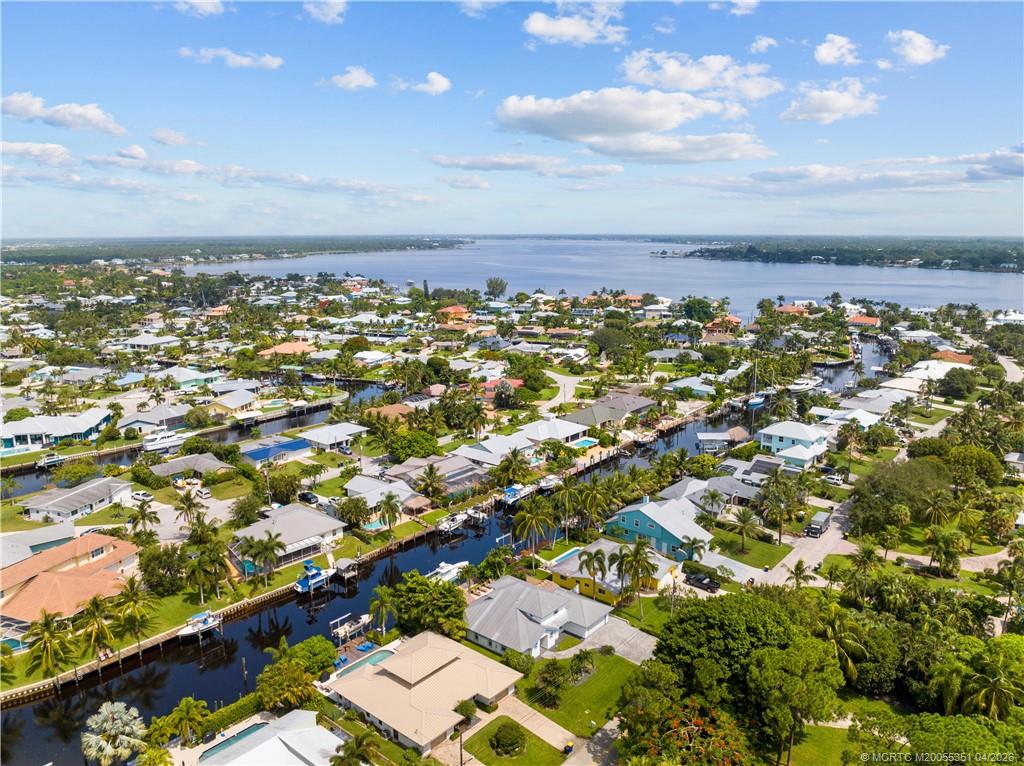 1459 Southwest Seahawk Way Palm City, FL 34990 - Photo 2 of 11 an aerial view of residential building with parking space
