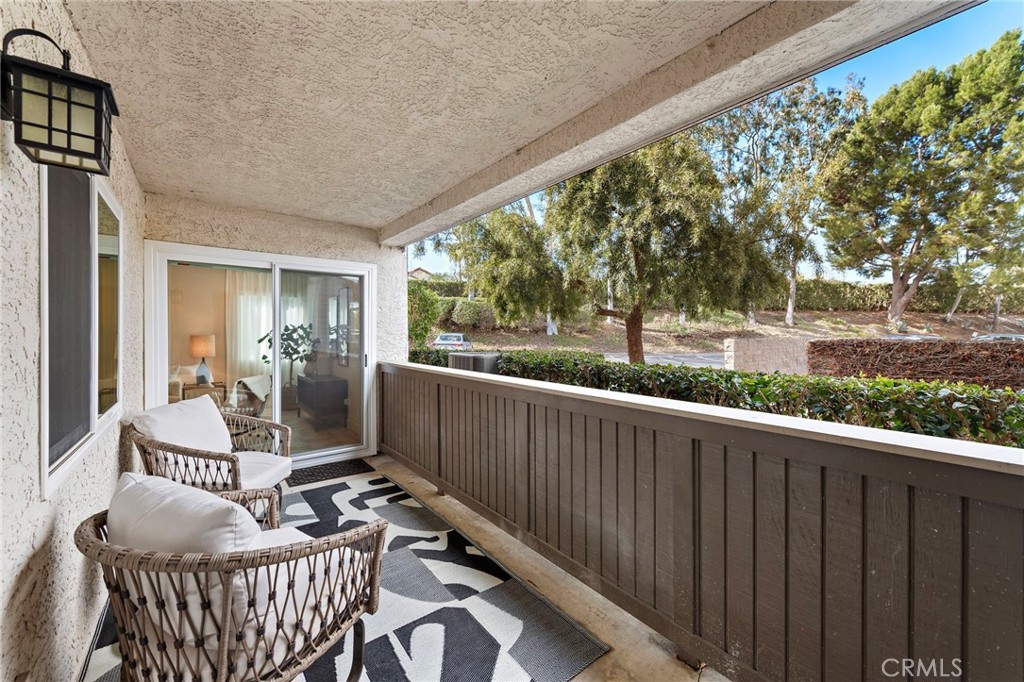 74 Corniche Drive, Unit D Dana Point, CA 92629 - Photo 13 of 22 a view of a balcony with furniture