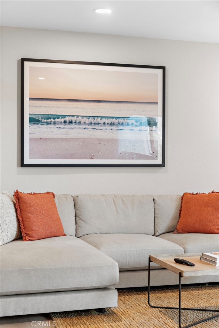 74 Corniche Drive, Unit D Dana Point, CA 92629 - Photo 16 of 22 a living room with a couch