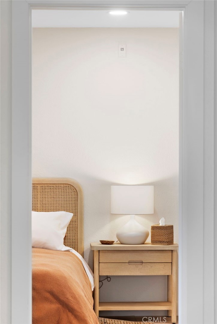 74 Corniche Drive, Unit D Dana Point, CA 92629 - Photo 20 of 22 a bedroom with a bed and dresser