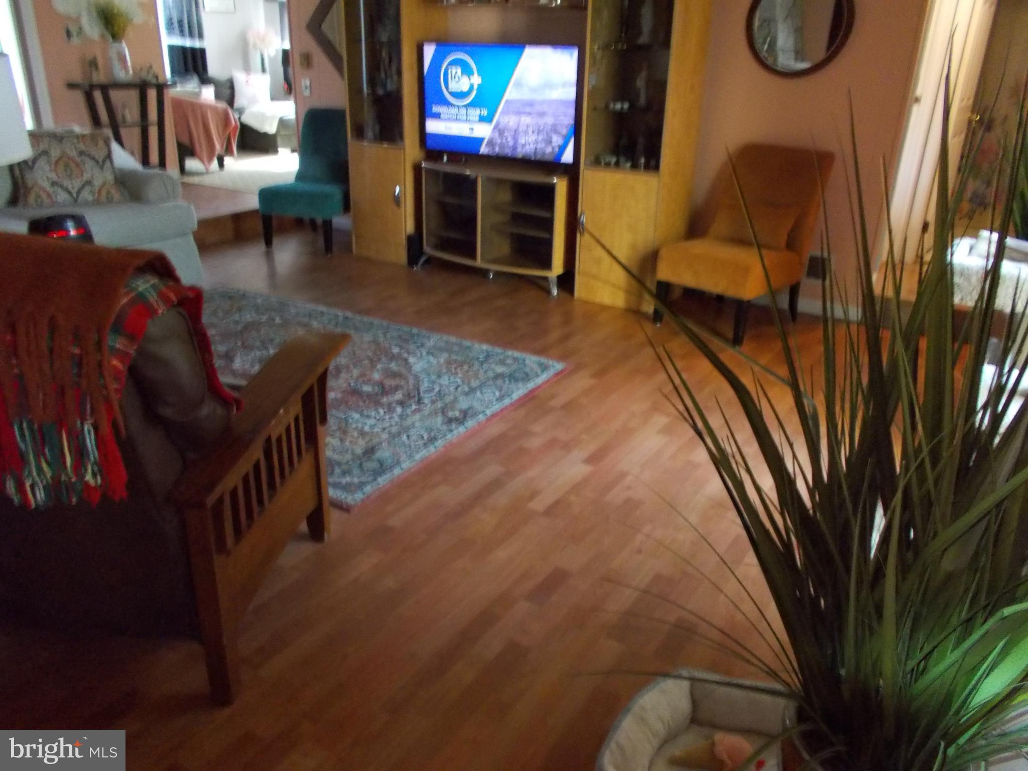 6 Cheyenne Drive Hazleton, PA 18202 - Photo 4 of 20 a living room with furniture and a flat screen tv