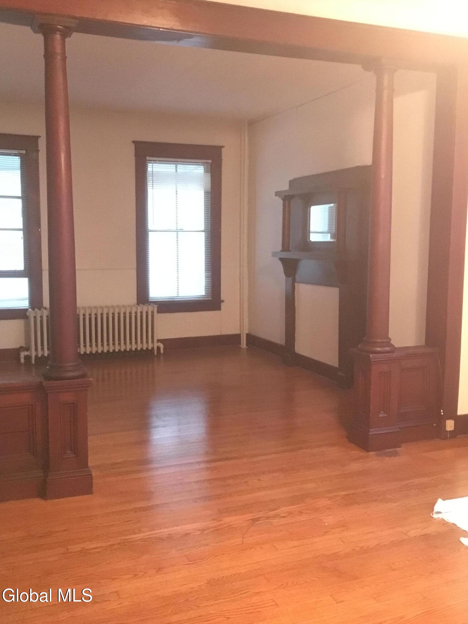 307 Broadway, Unit 1 Menands, NY 12204 - Photo 5 of 15 dining room/living room