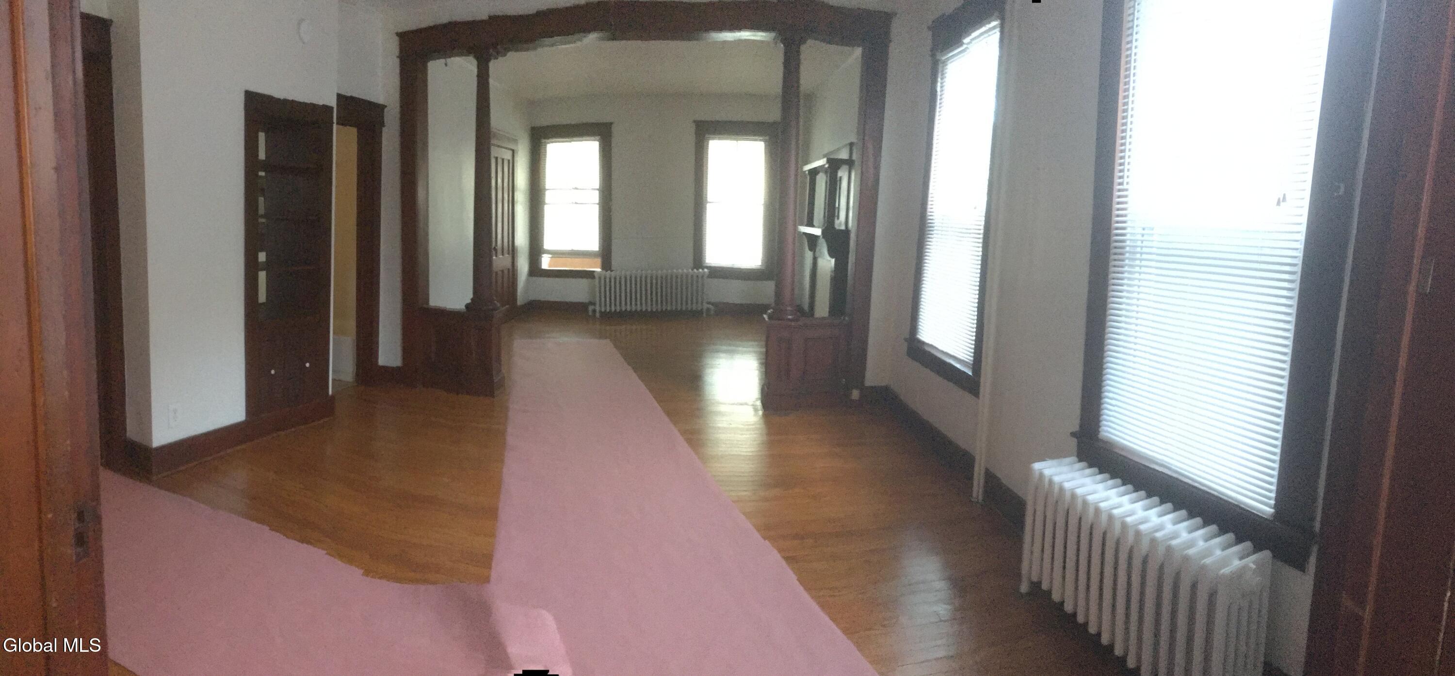 307 Broadway, Unit 1 Menands, NY 12204 - Photo 6 of 15 dining/living room