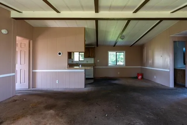 a view of livingroom with furniture and window