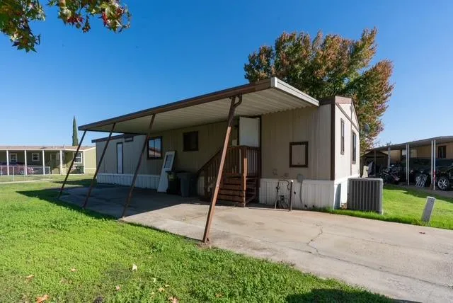 a house view with a garden space