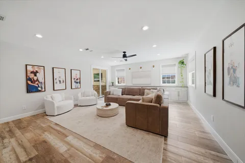 a living room with furniture and a table