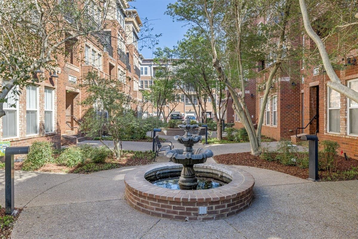 79 Shoemaker Court, Unit 104 Memphis, TN 38103 - Photo 2 of 22 a view of a fountain in the middle of a house
