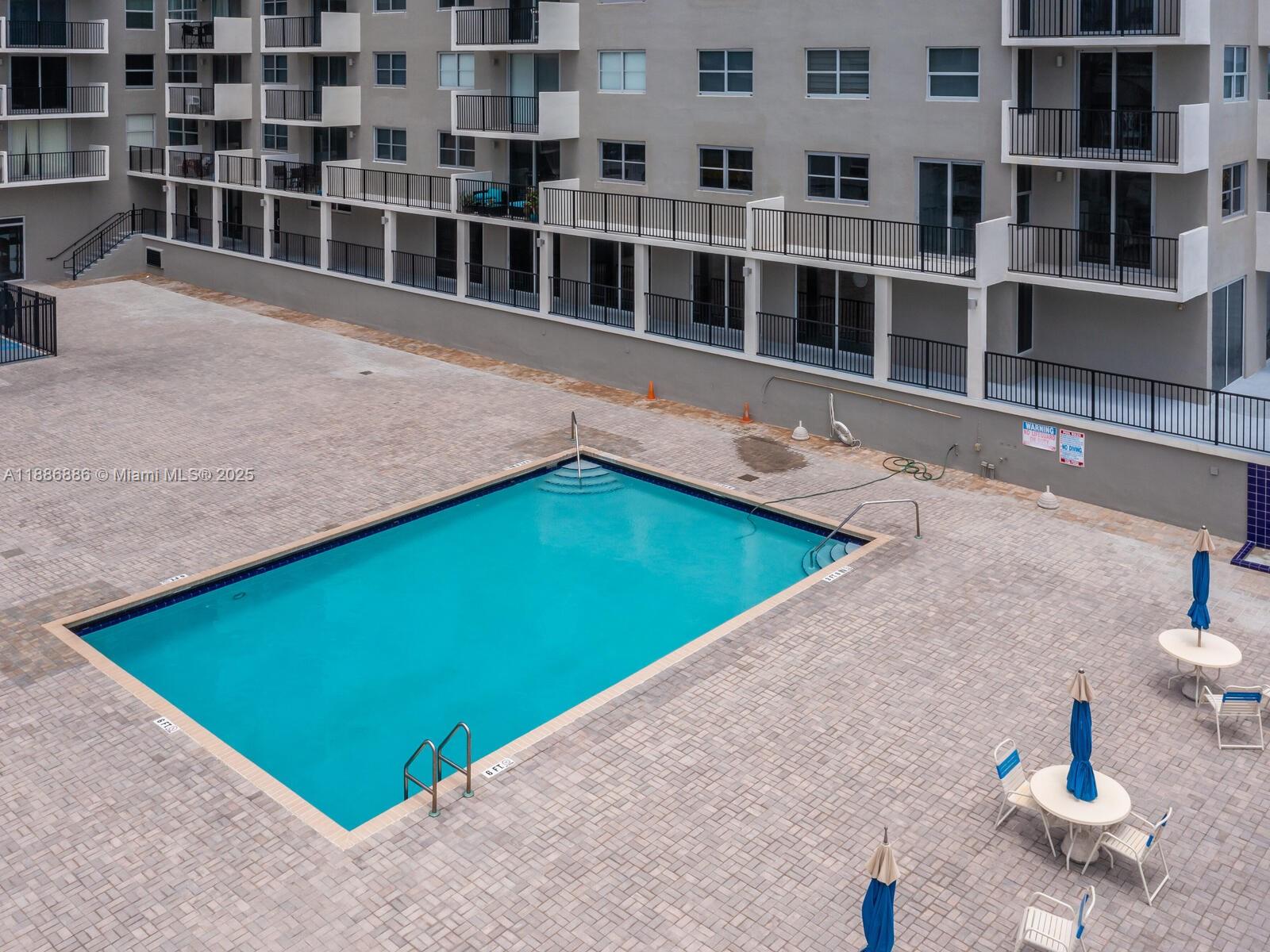 9273 Collins Avenue, Unit 703 Surfside, FL 33154 - Photo 31 of 49 a view of a living room with furniture
