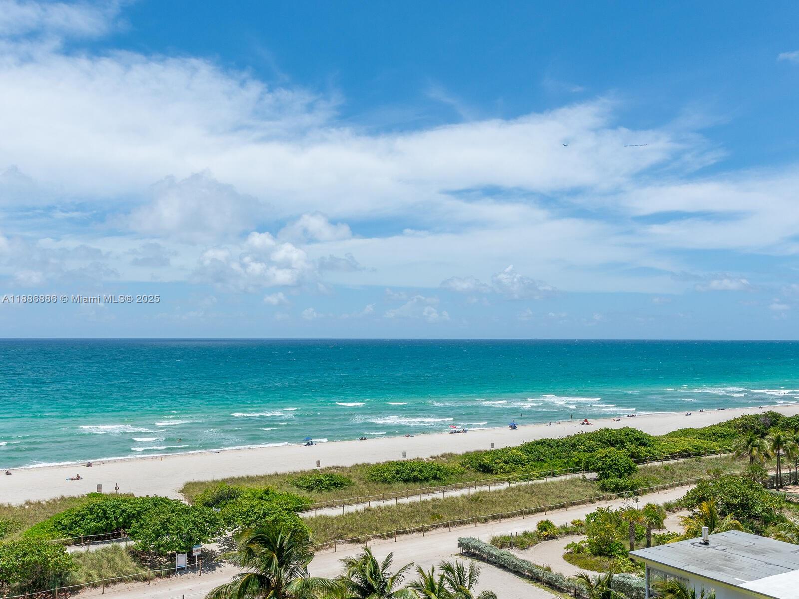 9273 Collins Avenue, Unit 703 Surfside, FL 33154 - Photo 39 of 49 a view of an ocean and beach