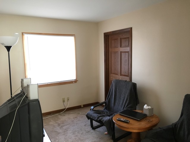 733 North 12th Street DeKalb, IL 60115 - Photo 3 of 14 a room with furniture and window