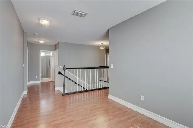 a view of hallway with stairs