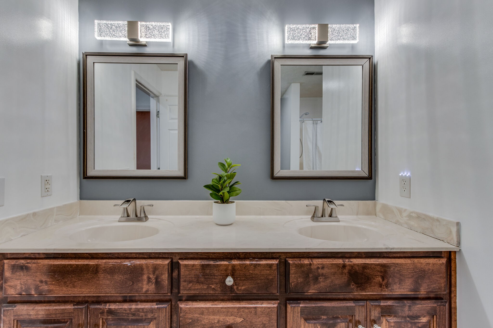 662 Strawberry Ridge Manchester, TN 37355 - Photo 38 of 63 a bathroom with double vanity sinks and a mirror