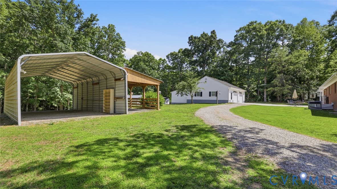 1611 Otterdale Road Midlothian, VA 23114 - Photo 37 of 52 Metal carport w/ lean-to