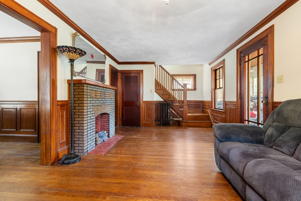 6 Peter Tufts Road Arlington, MA 02474 - Photo 22 of 35 a living room with furniture floor and a flat screen tv