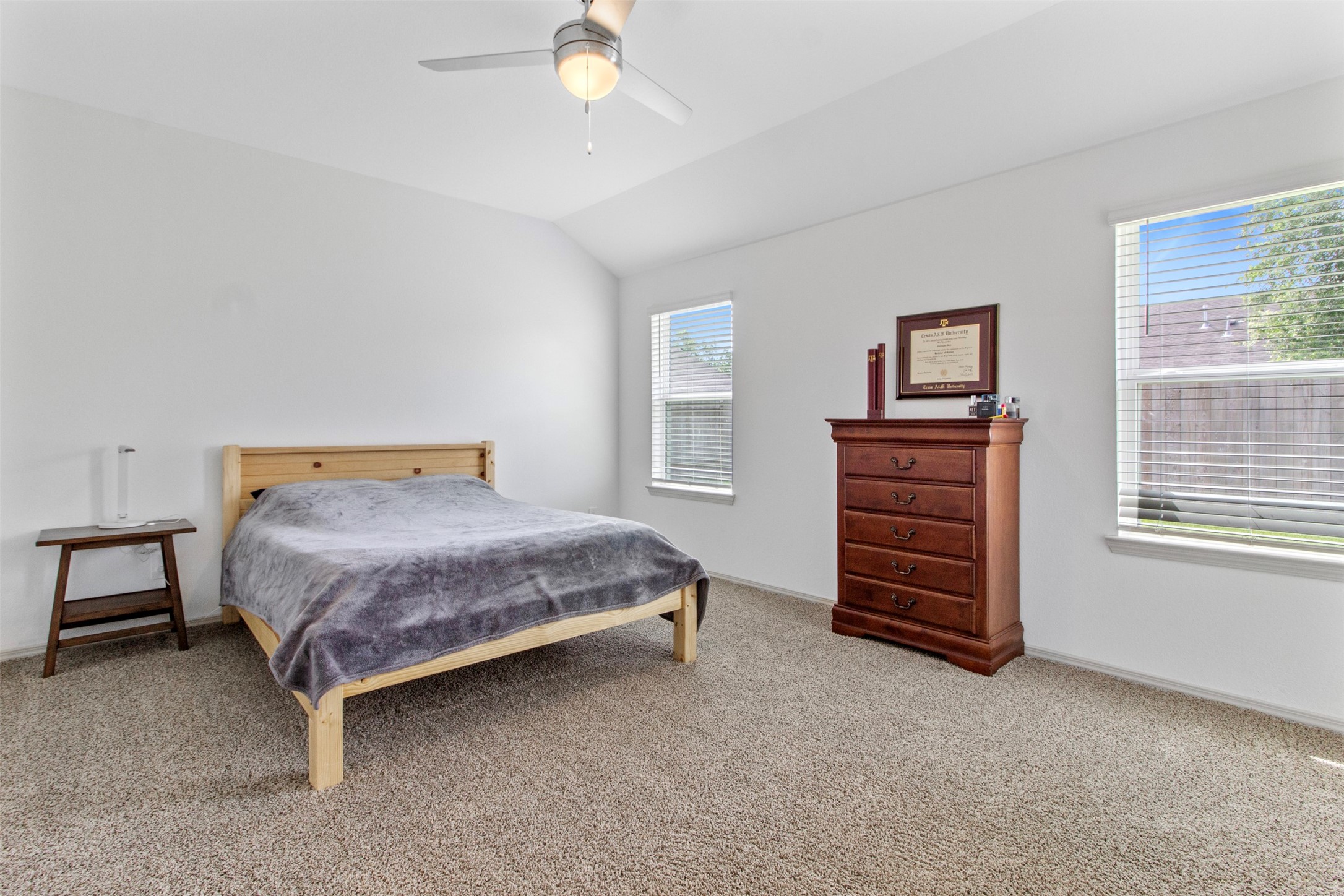 6685 Riplee Street Beaumont, TX 77713 - Photo 15 of 29 Primary bedroom with vaulted ceilings