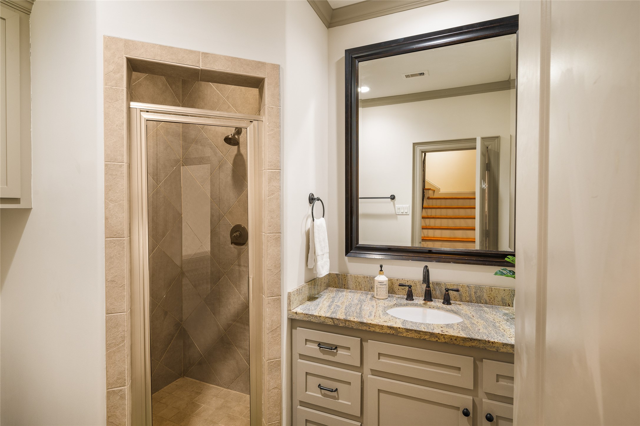 1655 Castle Court Houston, TX 77006 - Photo 11 of 32 The 1st floor secondary full bathroom includes a sleek shower.