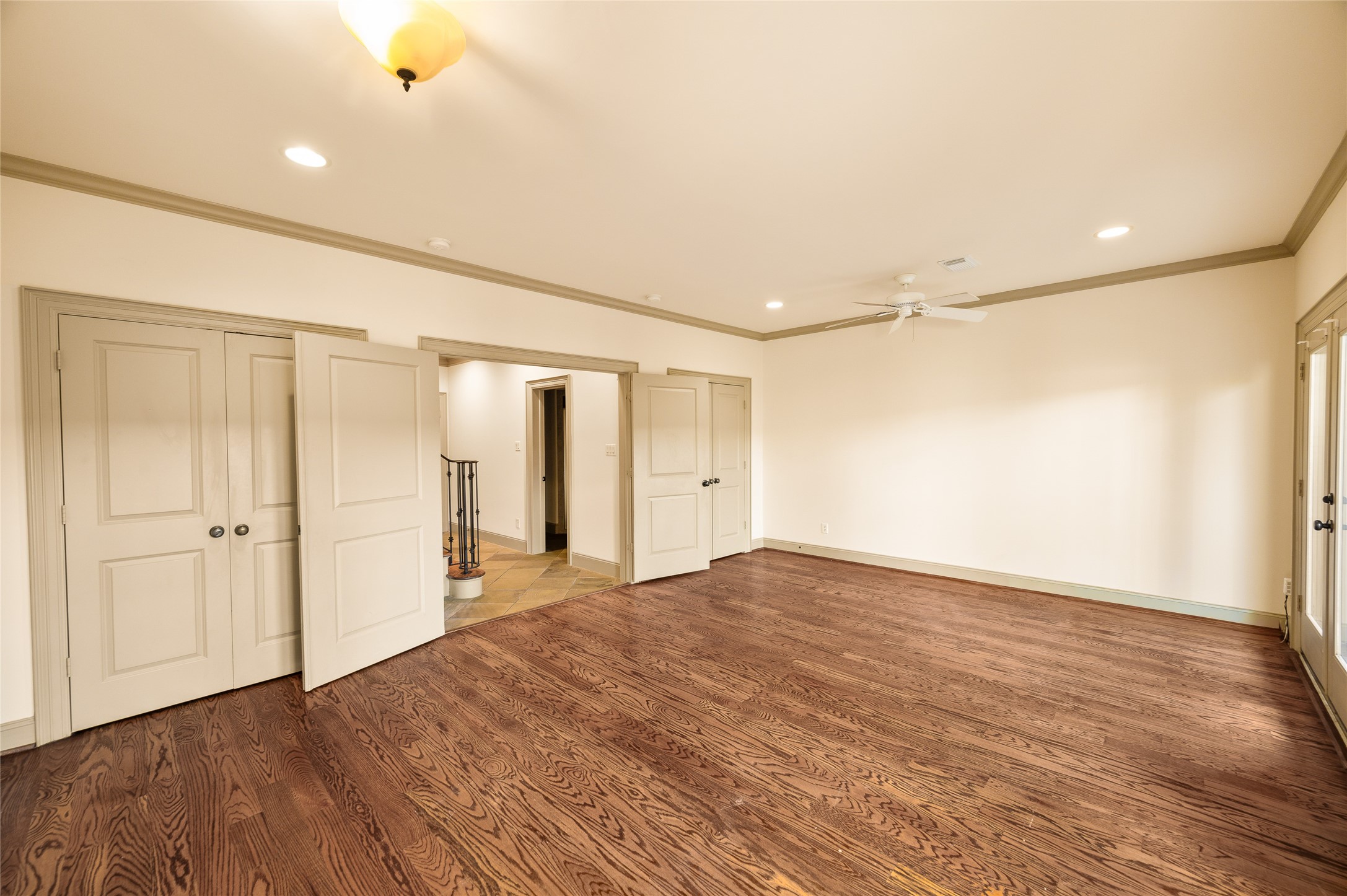 1655 Castle Court Houston, TX 77006 - Photo 12 of 32 The 1st floor bedroom offers dual closets and the potential to be divided into two separate rooms, thanks to independent lighting wiring.
