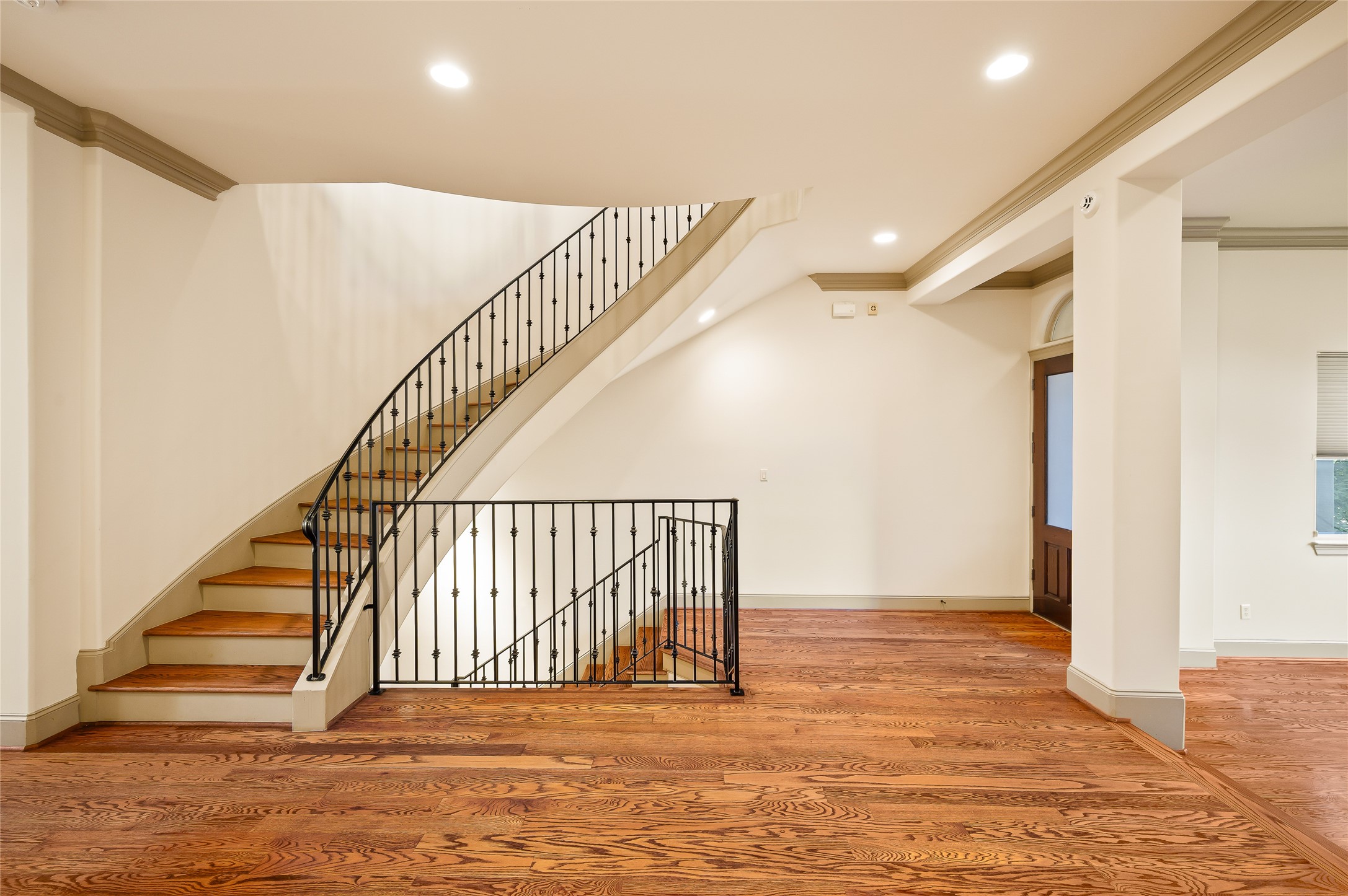 1655 Castle Court Houston, TX 77006 - Photo 21 of 32 Follow the sweeping staircase up to see your primary retreat!