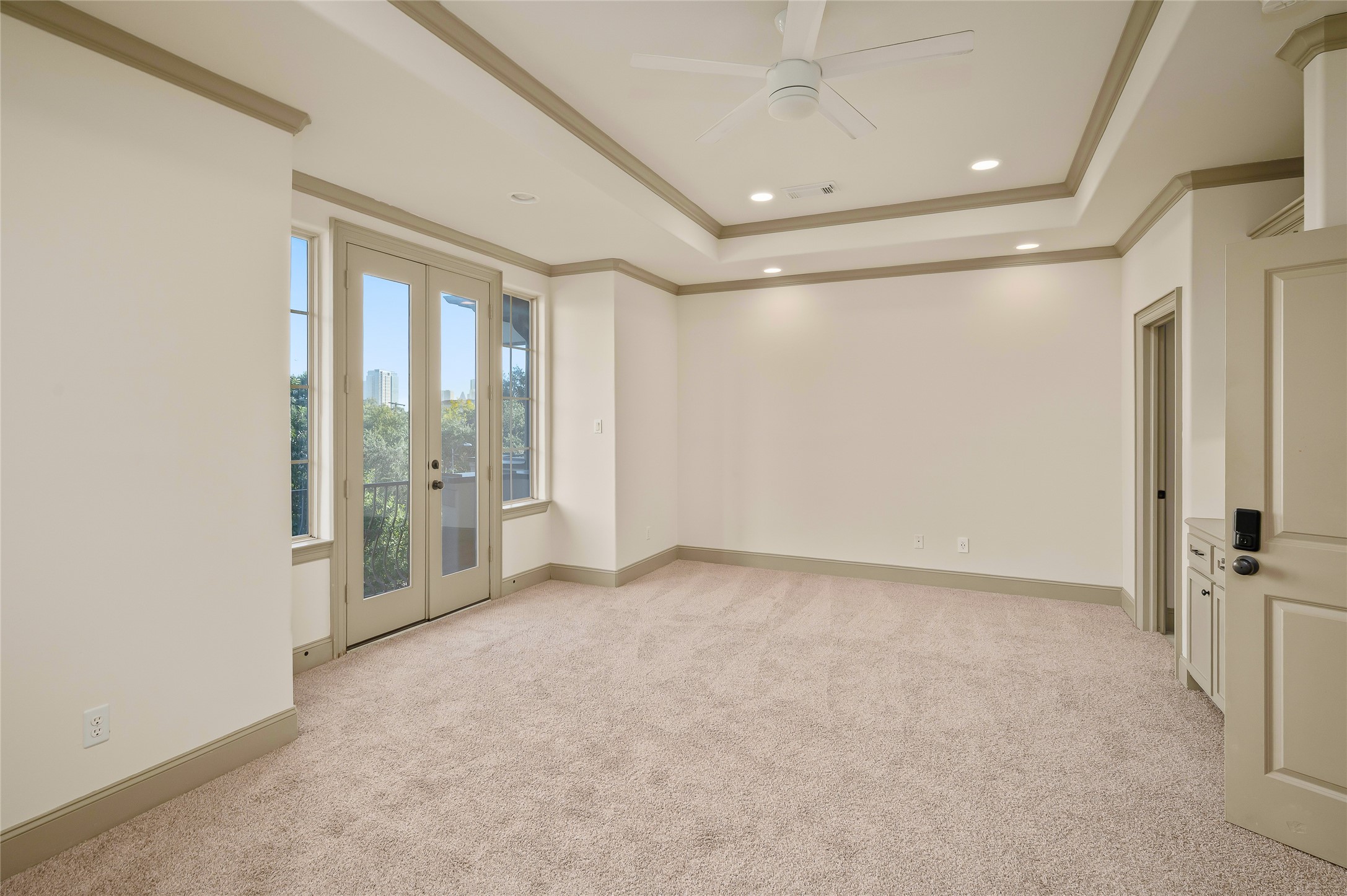 1655 Castle Court Houston, TX 77006 - Photo 26 of 32 Take in the terrace view from your primary bedroom.