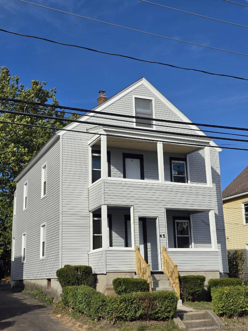 45 Clinton Street New Britain, CT 06053 - Photo 1 of 1 a front view of a house with a yard