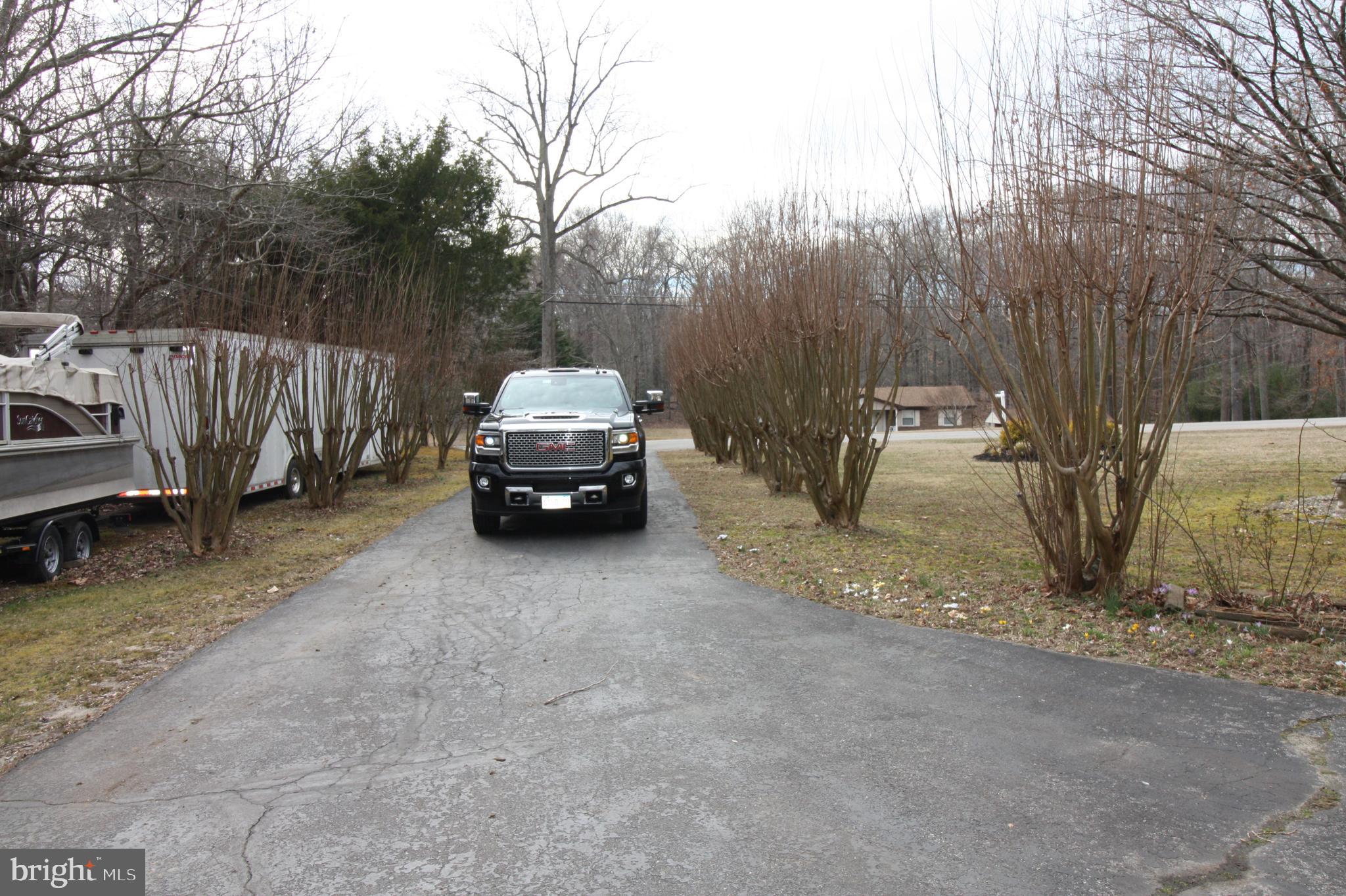 4340 Columbia Park Road Pomfret, MD 20675 - Photo 10 of 29 Tree lined driveway plus parking for trailer