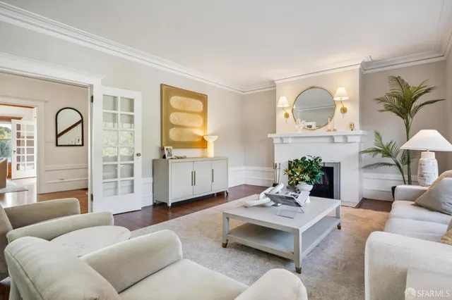 a kitchen with granite countertop a sink stove and cabinets