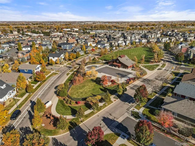 a picture of a bench in front of a wall
