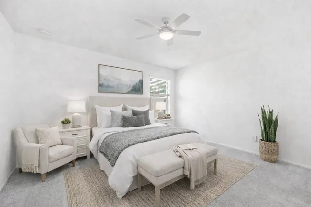 a bed room with a bed and a couch