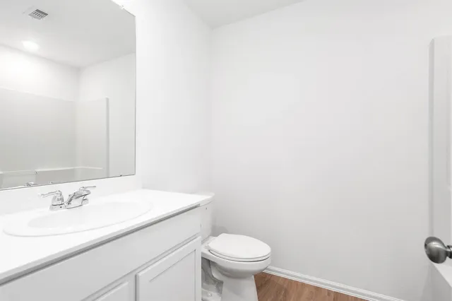 a bathroom with a sink and a toilet