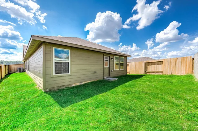 a view of a backyard with a garden
