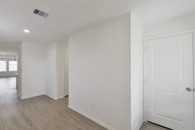 a kitchen with stainless steel appliances a stove a sink and a microwave