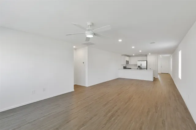 a bedroom with a bed and cabinet