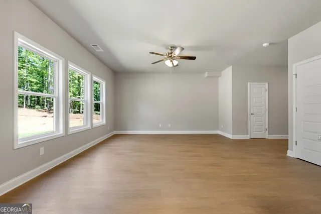 a kitchen with a stove a sink and a refrigerator