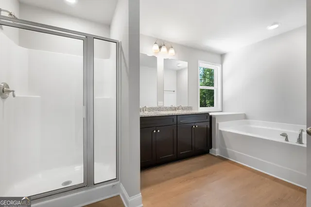 a view of storage and utility room with windows
