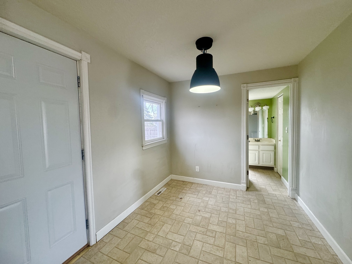 202 North Washington Street Joy, IL 61260 - Photo 5 of 12 a view of an empty room and window
