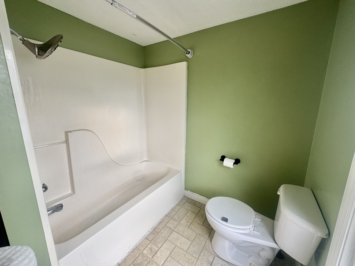202 North Washington Street Joy, IL 61260 - Photo 10 of 12 a bathroom with a toilet and a shower